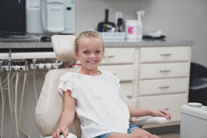 Dental patient in dental chair 